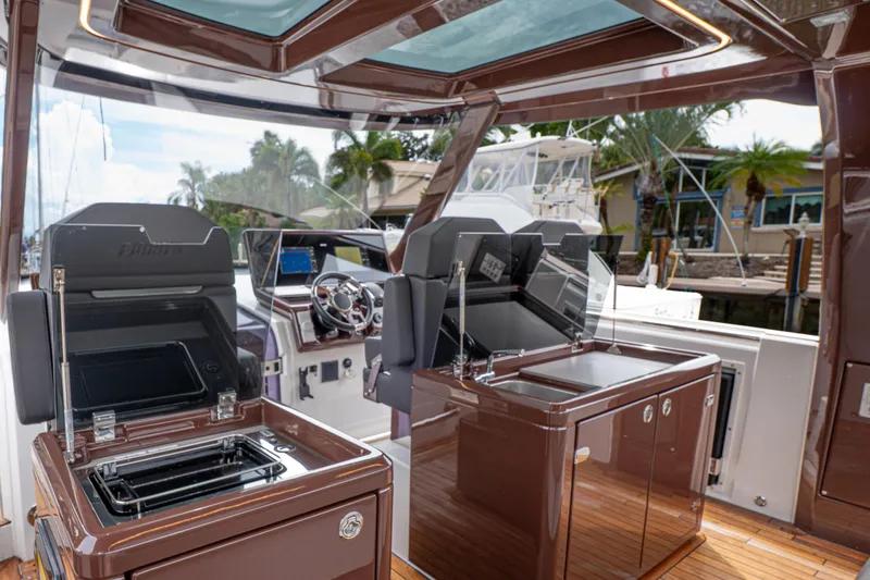 Slide: The Image of 2024 Fjord 41 XP yacht interior with modern helm and sleek design features. - 6