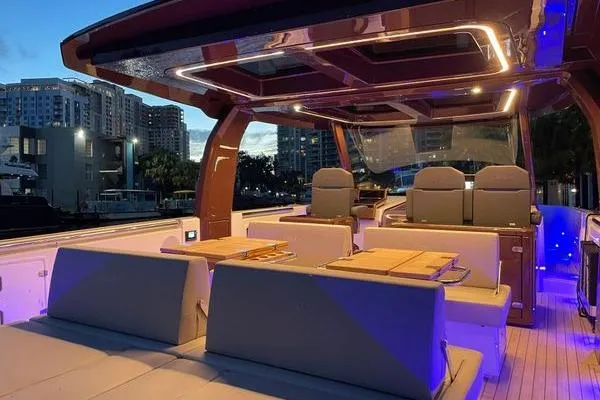 Slide: The Image of Luxurious 2024 Fjord 41 XP yacht interior with modern seating and ambient lighting. - 35