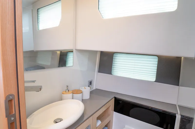 Slide: The Image of Modern bathroom interior of 2024 Fjord 41 XP yacht with sleek design and natural lighting. - 28