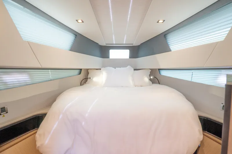 Slide: The Image of Luxurious bedroom interior of 2024 Fjord 41 XP yacht with modern design and cozy bedding. - 26