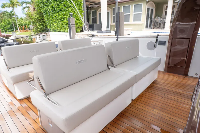 Slide: The Image of Luxurious seating on 2024 Fjord 41 XP yacht with sleek wooden deck. - 18