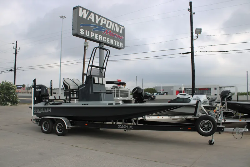 The Image of 2026 Freedom Boats 24 Defender on trailer at Waypoint Marine Supercenter. - 0