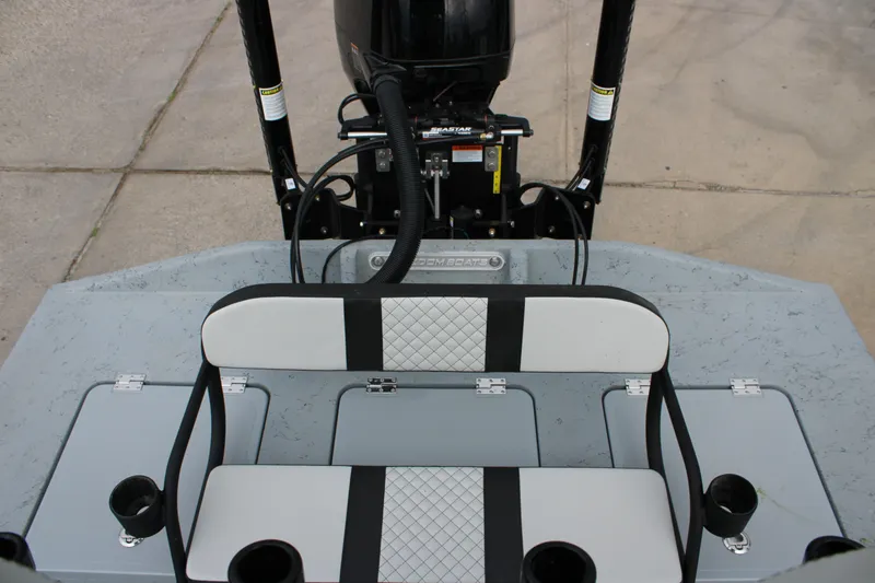Slide: The Image of 2026 Freedom Boats 24 Defender rear seating and motor detail. - 18