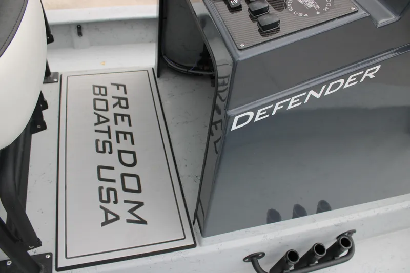 Slide: The Image of 2026 Freedom Boats 24 Defender interior with branding details. - 20