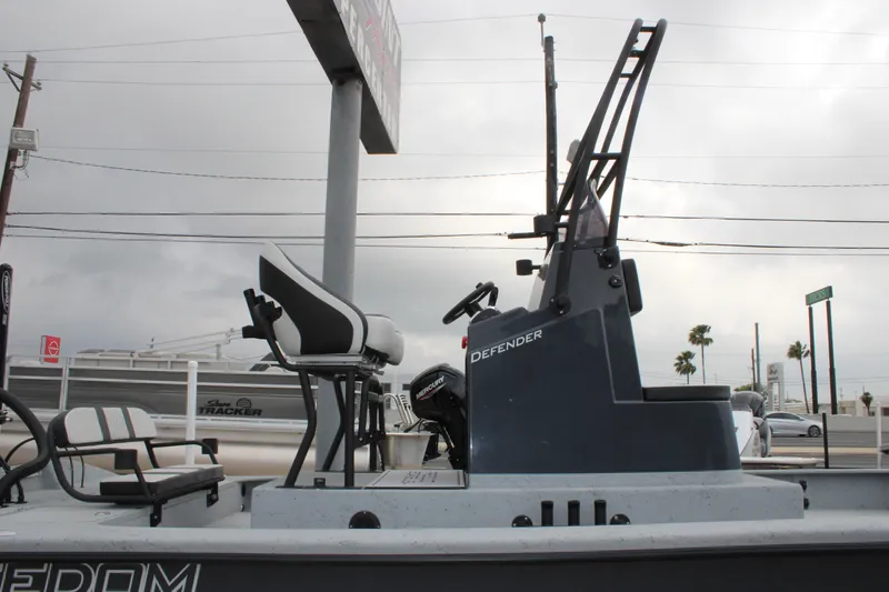Slide: The Image of 2026 Freedom Boats 24 Defender, side view, showcasing sleek design and modern features. - 6