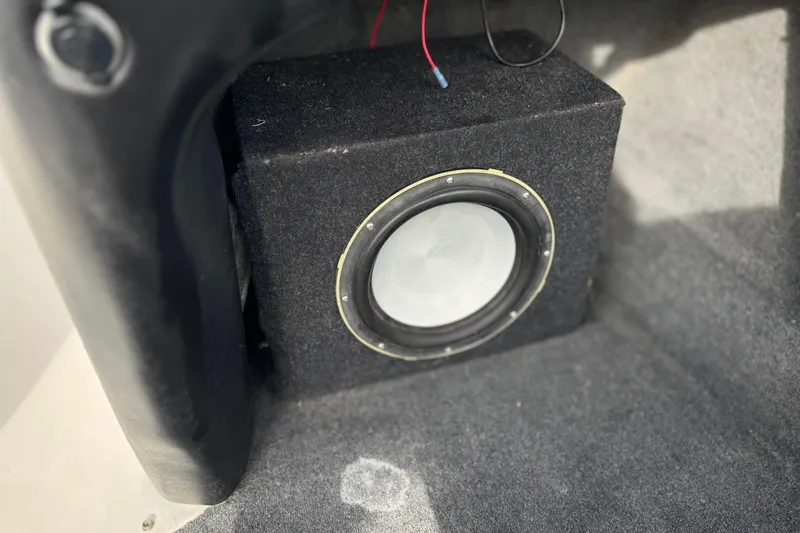 Slide: The Image of Subwoofer installed in a 2006 Tigé 22V boat, enhancing audio experience. - 31