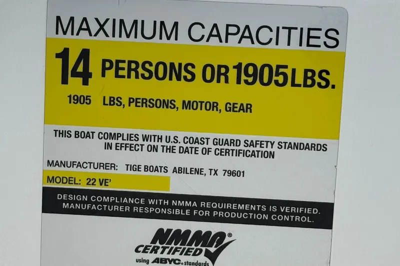 Slide: The Image of Capacity label for 2006 Tigé 22V boat, maximum 14 persons or 1905 lbs. - 35