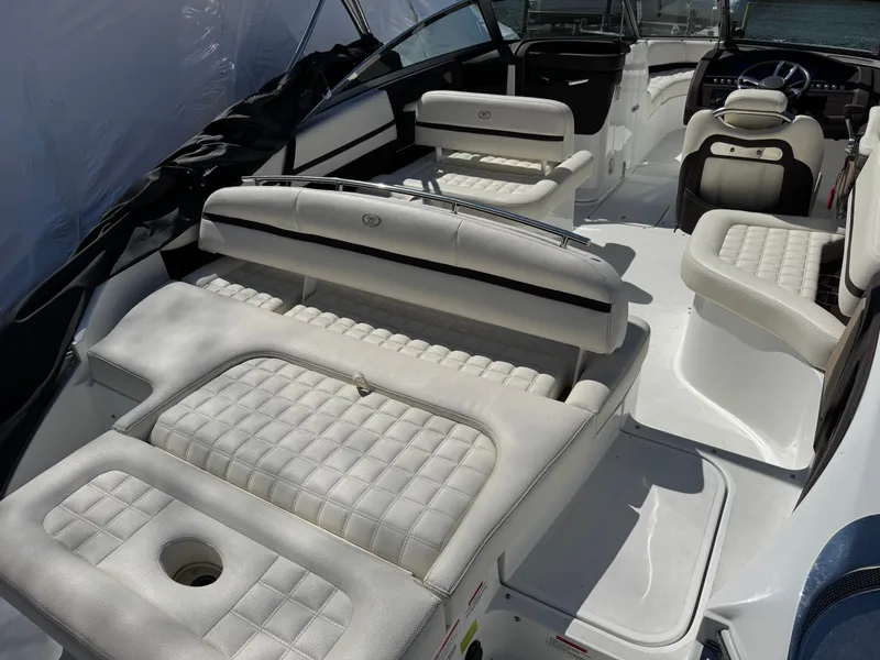 Slide: The Image of Interior of a 2017 Cobalt R5 boat with white leather seating. - 10