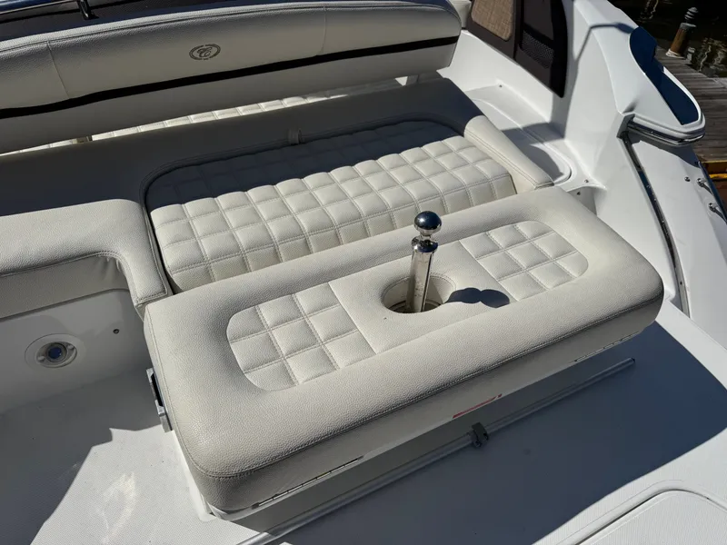 Slide: The Image of Interior of a 2017 Cobalt R5 boat with cushioned seating. - 12