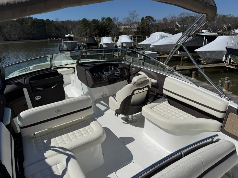 Slide: The Image of Interior of a 2017 Cobalt R5 boat at the dock. - 13