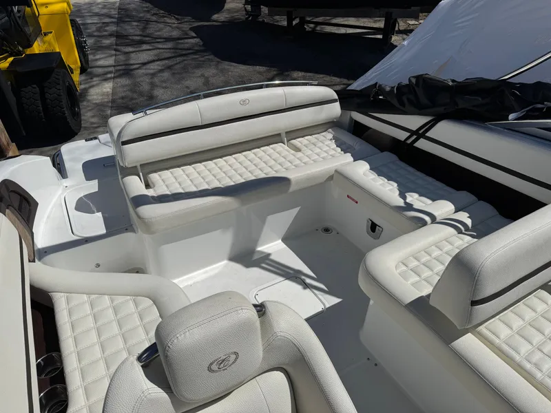 Slide: The Image of Interior of a 2017 Cobalt R5 boat with white upholstery. - 14