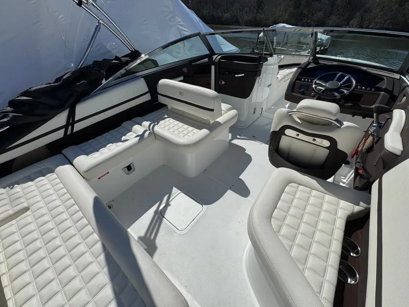 Slide: The Image of Interior of a 2017 Cobalt R5 boat with white seating. - 15