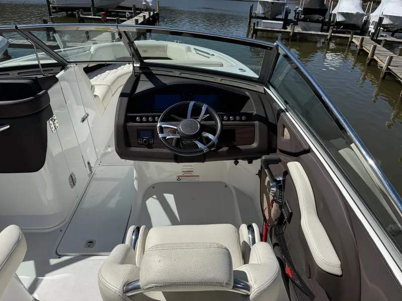 Slide: The Image of Interior view of a 2017 Cobalt R5 boat at the dock. - 18