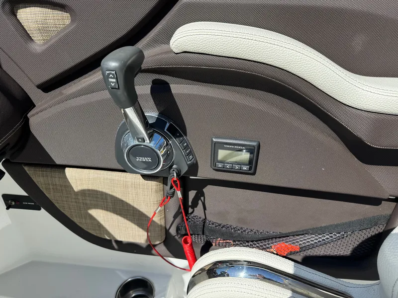 Slide: The Image of Close-up of a 2017 Cobalt R5 boat throttle control. - 21