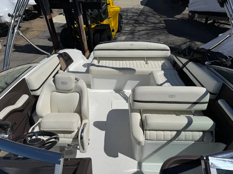 Slide: The Image of Interior of a 2017 Cobalt R5 boat with white leather seating. - 22