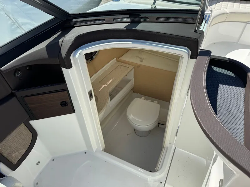 Slide: The Image of Interior of a 2017 Cobalt R5 featuring a toilet. - 23