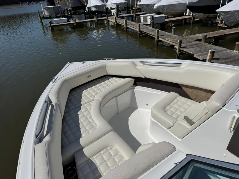 Slide: The Image of Interior view of a 2017 Cobalt R5 boat at the dock. - 26
