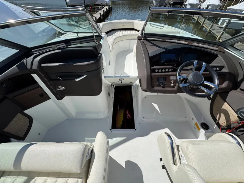 Slide: The Image of Interior of a 2017 Cobalt R5 boat with steering console. - 28