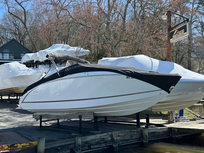 Slide: The Image of 2017 Cobalt R5 boat docked outdoors. - 4