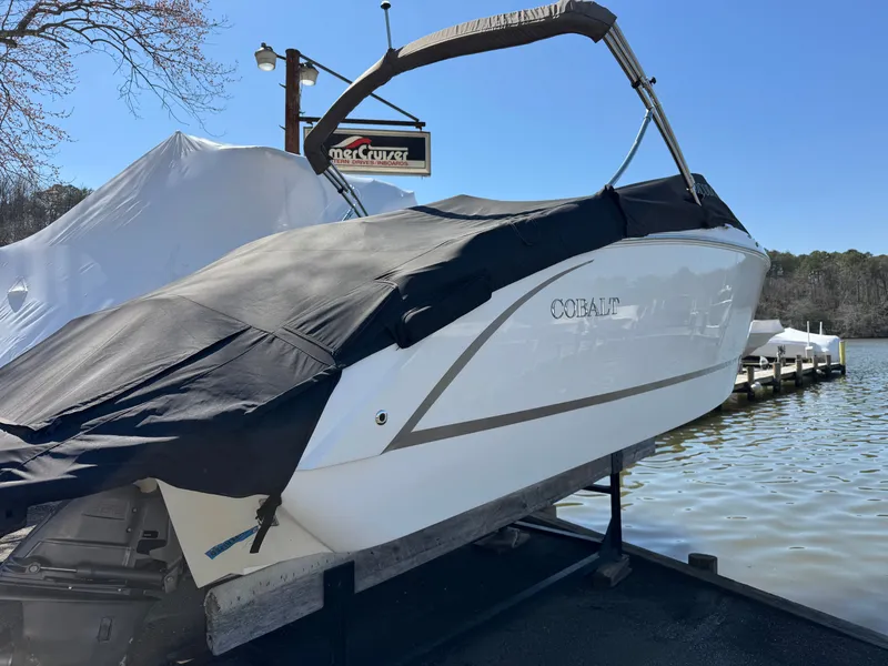 Slide: The Image of 2017 Cobalt R5 boat with cover at lakeside dock. - 5