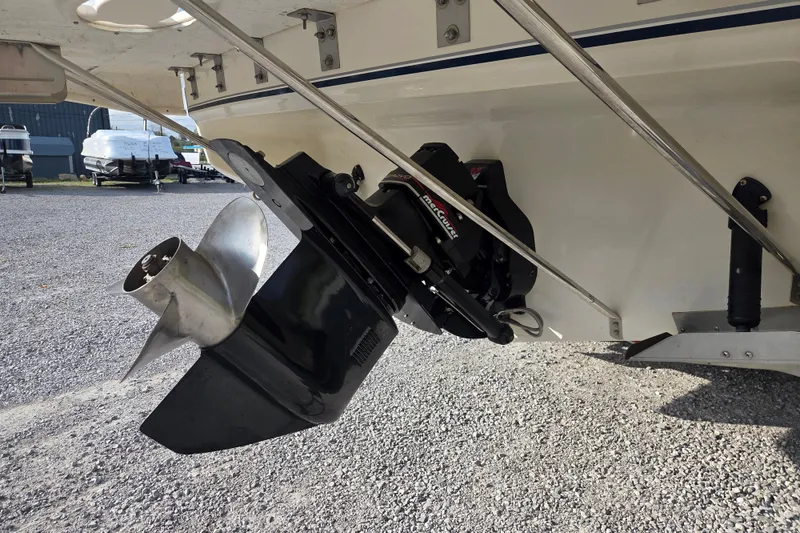 Slide: The Image of 2001 Doral 270 SC boat with MerCruiser outdrive and stainless steel propeller. - 22