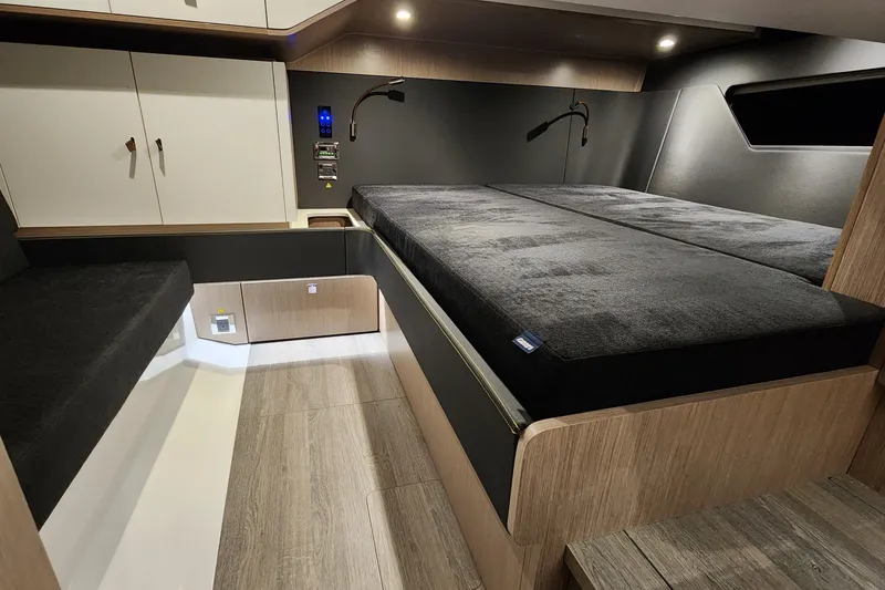 Slide: The Image of 2023 Fjord 41 XL cabin interior with modern design and comfortable bedding. - 35