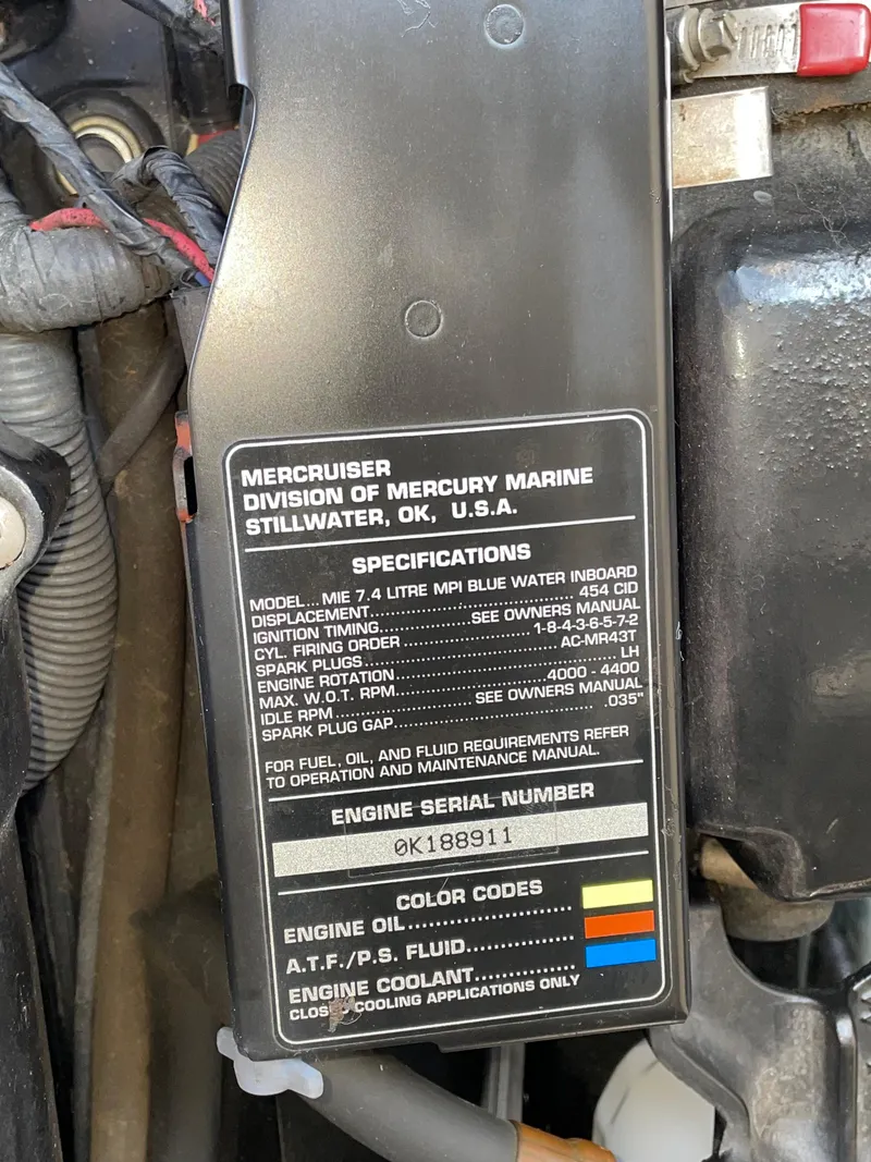 Slide: The Image of Engine specifications label on a 1997 Sea Ray 330 Express, featuring MerCruiser details. - 25