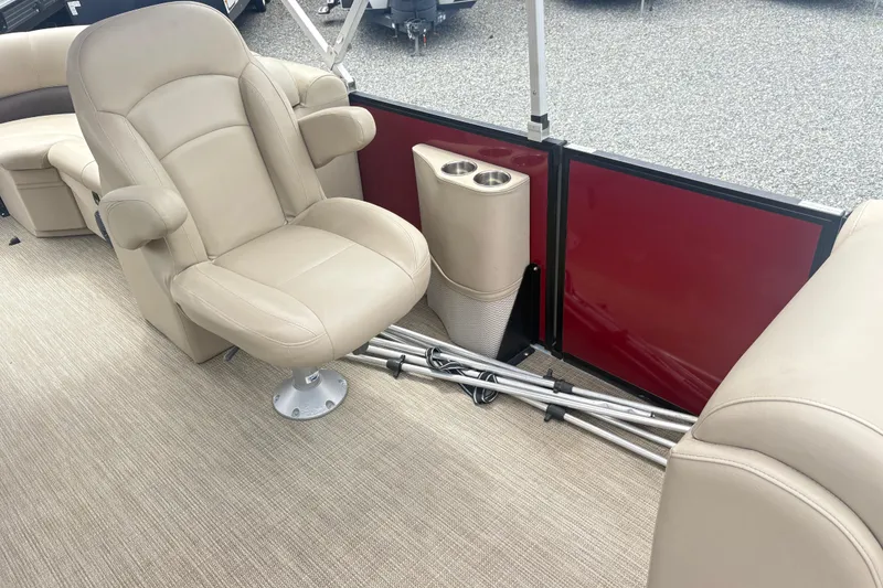 Slide: The Image of Luxurious seating on 2022 Bentley Pontoons 220 Navigator with beige upholstery and cup holders. - 3