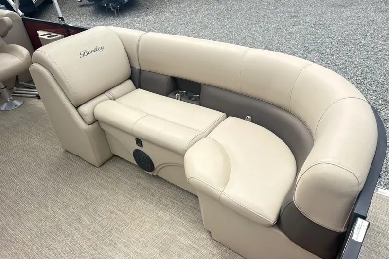 Slide: The Image of 2022 Bentley Pontoons 220 Navigator, beige seating, luxurious interior design. - 6