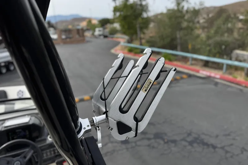 Slide: The Image of Wakeboard rack on 2019 Bayliner VR6 Bowrider I/O, parked in a lot. - 16