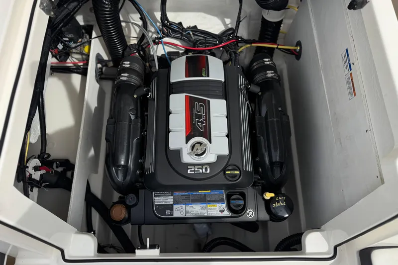 Slide: The Image of Engine compartment of a 2019 Bayliner VR6 Bowrider I/O, showcasing a 250 horsepower engine. - 20