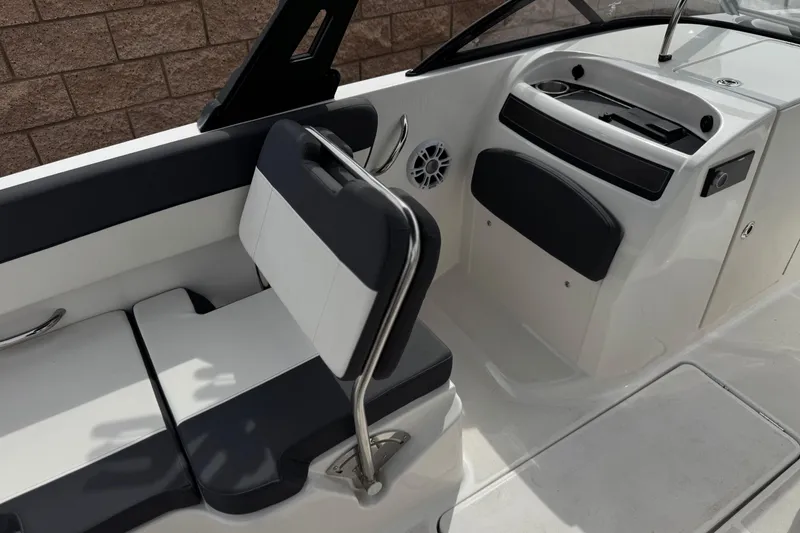 Slide: The Image of 2019 Bayliner VR6 Bowrider I/O interior with seating and dashboard details. - 25