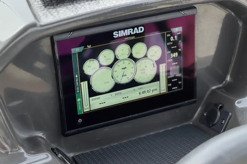 Slide: The Image of Simrad display on 2019 Bayliner VR6 Bowrider I/O dashboard showing engine metrics. - 34