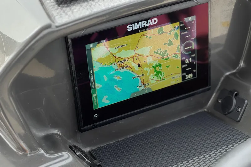 Slide: The Image of Simrad navigation display on 2019 Bayliner VR6 Bowrider I/O showing coastal map. - 35