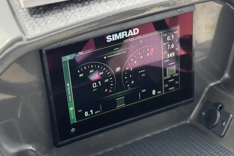 Slide: The Image of Simrad display on 2019 Bayliner VR6 Bowrider I/O showing speed and navigation data. - 36