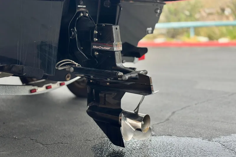 Slide: The Image of 2019 Bayliner VR6 Bowrider I/O with MerCruiser engine, rear view showing propeller. - 7