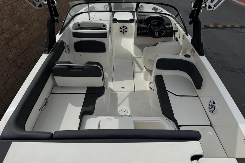 Slide: The Image of 2019 Bayliner VR6 Bowrider I/O interior with spacious seating and modern dashboard design. - 9