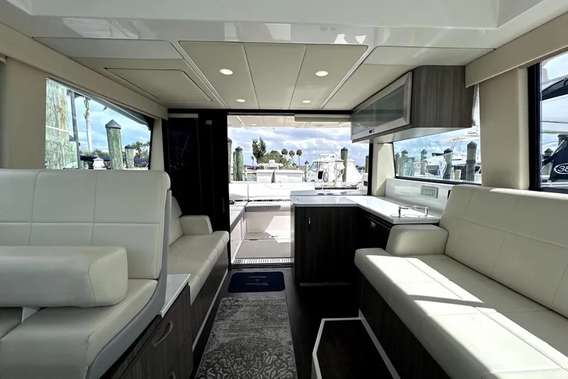 Slide: The Image of Interior of 2021 Regal 38 XO yacht with modern seating and sleek design. - 36