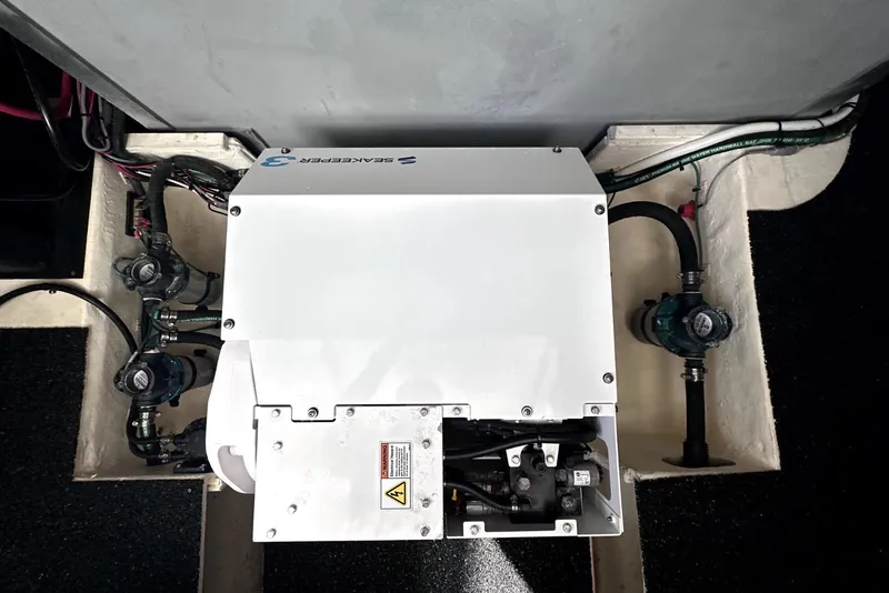 Slide: The Image of Engine compartment of a 2021 Regal 38 XO boat with SeaKeeper system. - 6