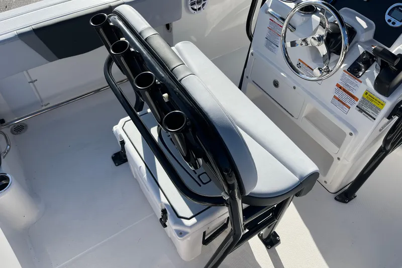 Slide: The Image of 2026 Robalo R200 Center Console boat interior with steering wheel and seating. - 22