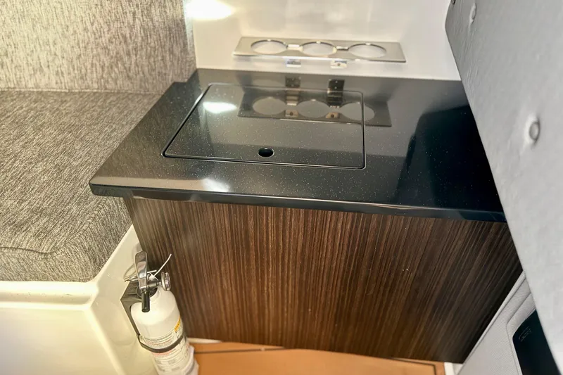 Slide: The Image of 2025 Cobalt R33 interior with sleek kitchenette and fire extinguisher. - 20