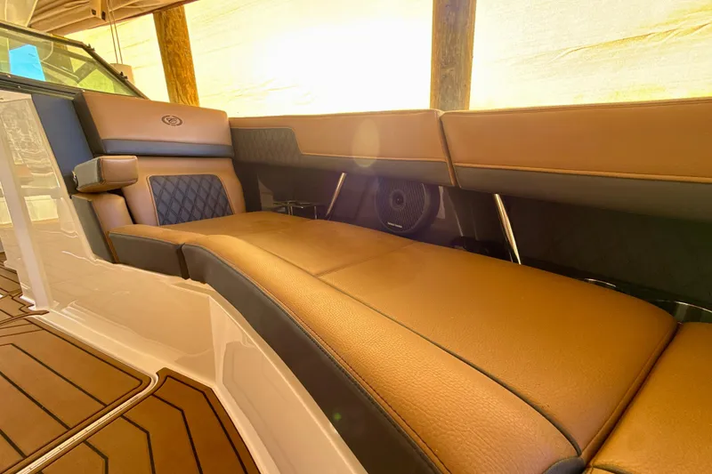 Slide: The Image of Luxurious interior of 2025 Cobalt R33 boat with brown leather seating. - 28