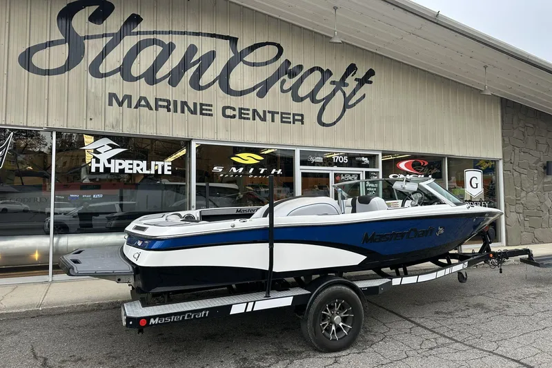 Slide: The Image of 2015 MasterCraft ProStar boat on trailer outside StanCraft Marine Center. - 3