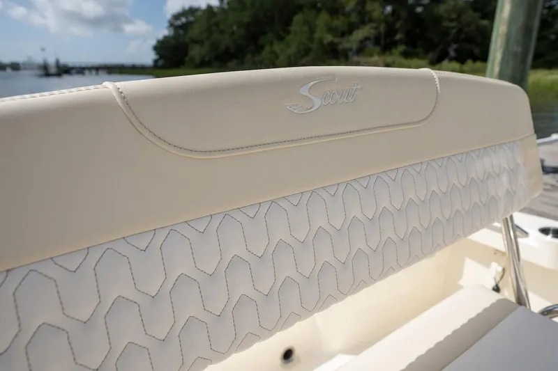 Slide: The Image of 2026 Scout 188 Sportfish boat seat with elegant stitching and logo detail. - 11