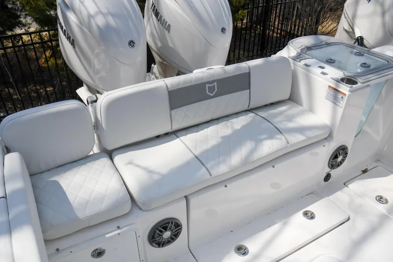 Slide: The Image of 2026 Sea Fox 268 Commander boat with Yamaha engines and cushioned seating. - 14