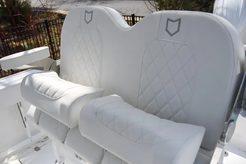 Slide: The Image of 2026 Sea Fox 268 Commander boat seats with diamond stitching and armrests. - 12