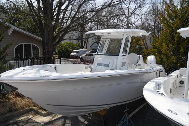 Slide: The Image of 2026 Sea Fox 268 Commander boat displayed outdoors, showcasing sleek design and modern features. - 1