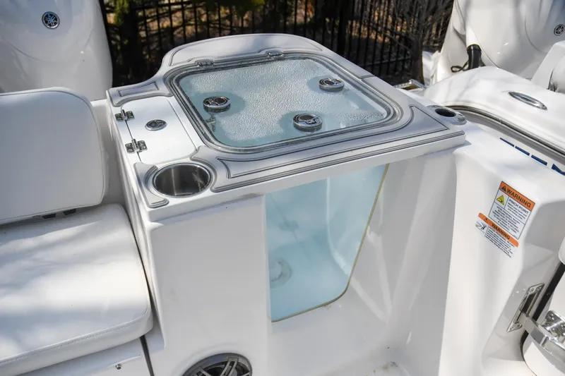 Slide: The Image of 2026 Sea Fox 268 Commander boat with livewell and cup holder on deck. - 15