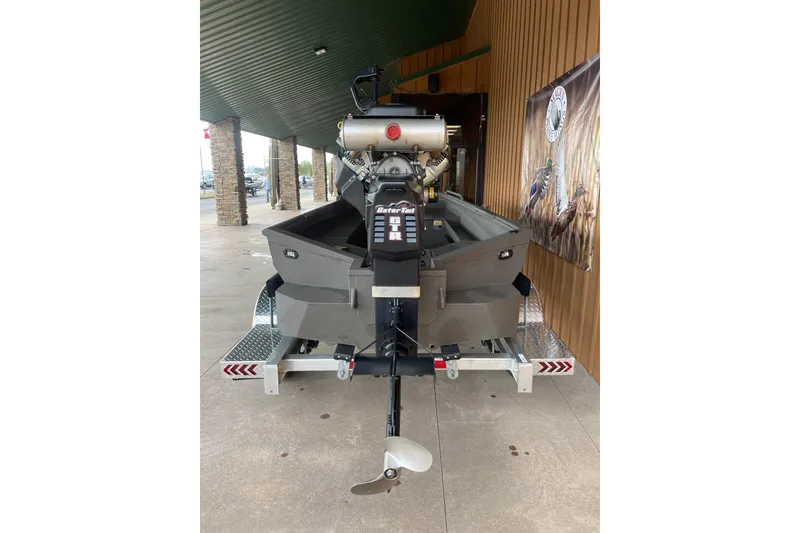 Slide: The Image of 2026 Reaper Boats 753 Timber Reaper on trailer, rear view, outdoor display. - 4