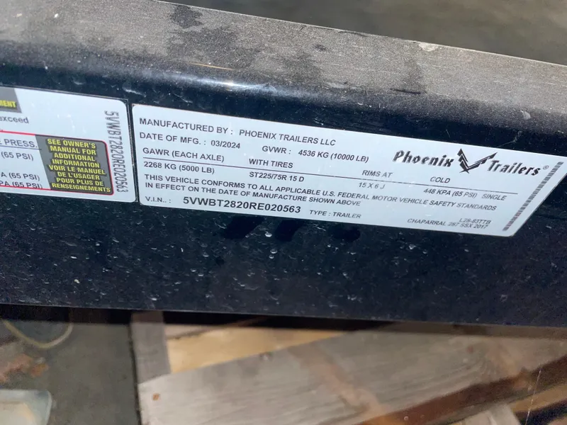Slide: The Image of Phoenix Trailers label on Chaparral 287 SSX, 2017 model, displaying manufacturing details and specifications. - 14
